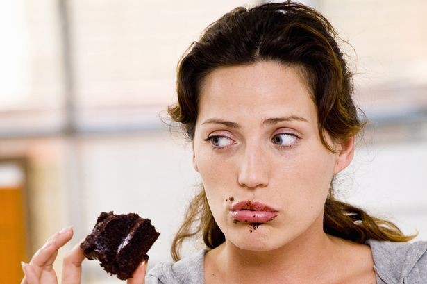 Woman-eating-chocolate-cake (1)