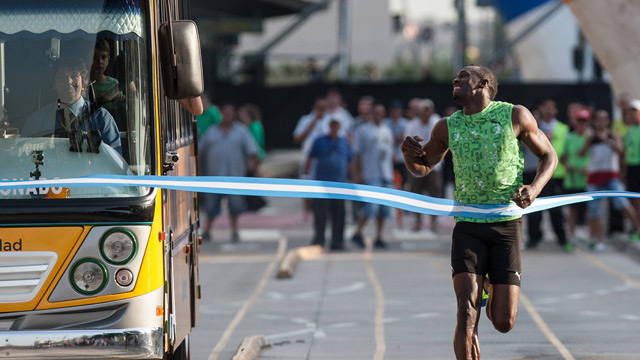 Usain Bolt Runs Against A Bus