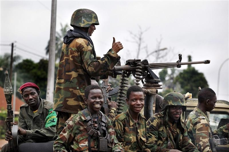 Seleka soldiers sit in a pick-up truck in Bangui