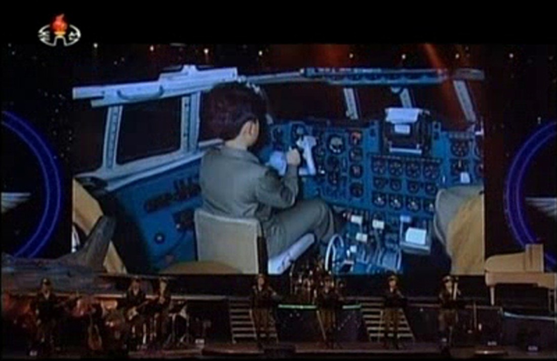 Still image from video broadcast by North Korea's state run television shows still photos of North Korean leader Kim Jong Un's childhood during a Moranbong concert in Pyongyang