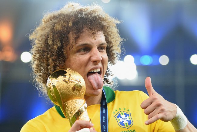 hi-res-172028710-david-luiz-of-brazil-celebrates-with-trophy-after_crop_exact